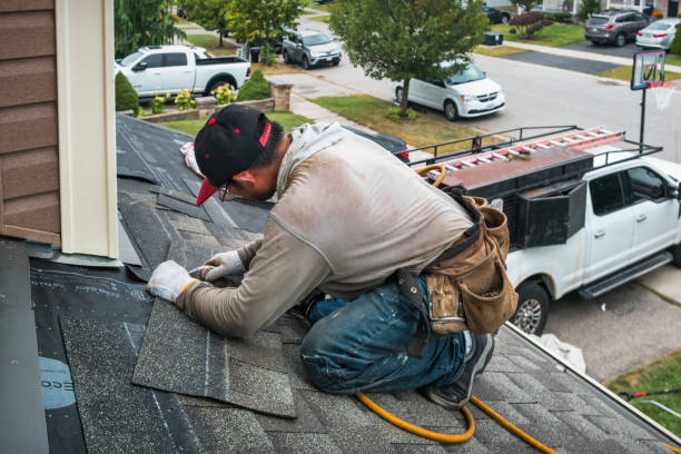 Professional Gutter Repair And Installation technician working in Kingston, RI